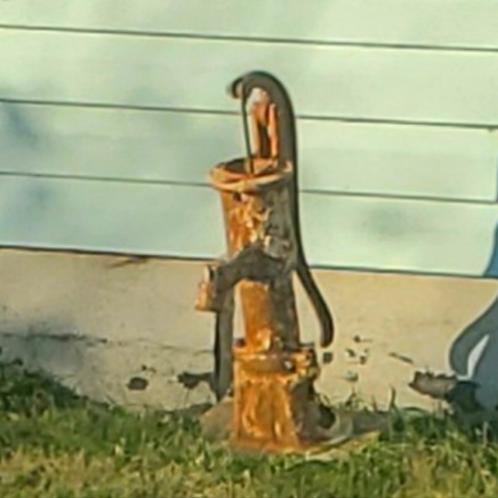 Antique hand water pump 1950s